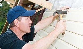 a man holding a hammer